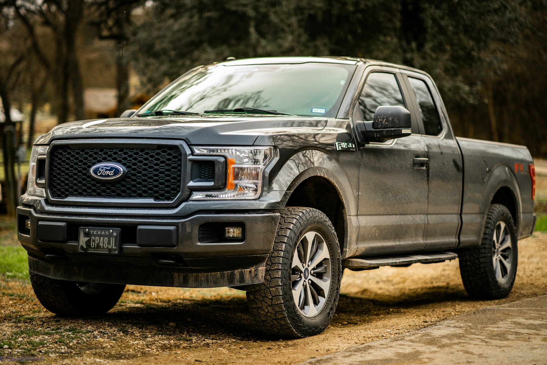 Ford pickup truck on a dirt road